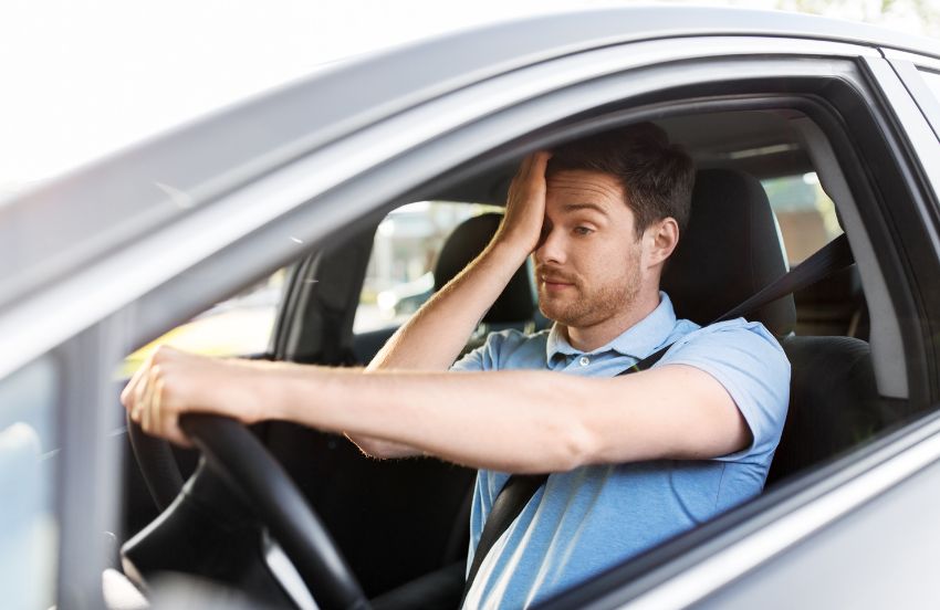 Sleepy man driving car